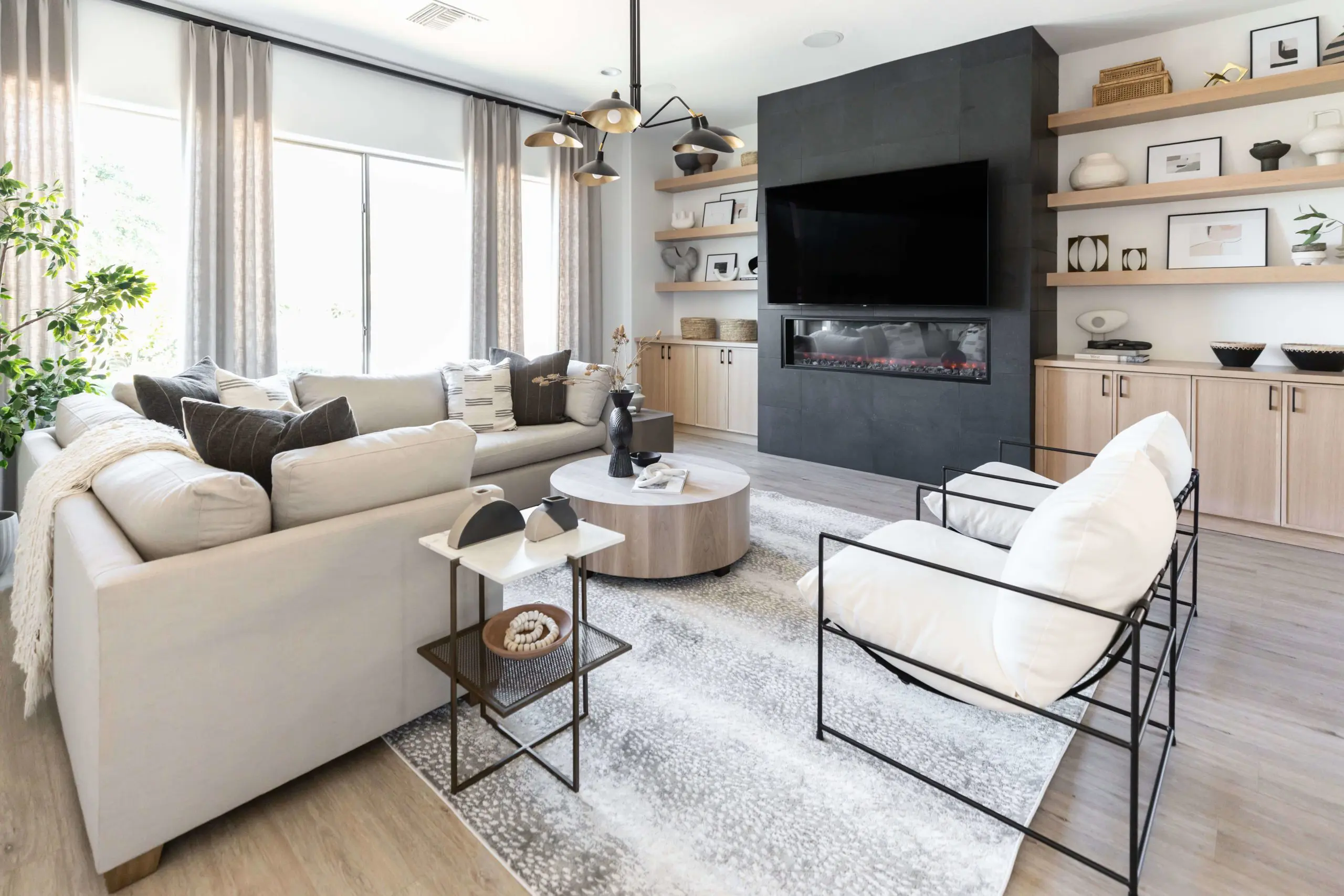 A Tucson living room with cream furniture and a modern fireplace
