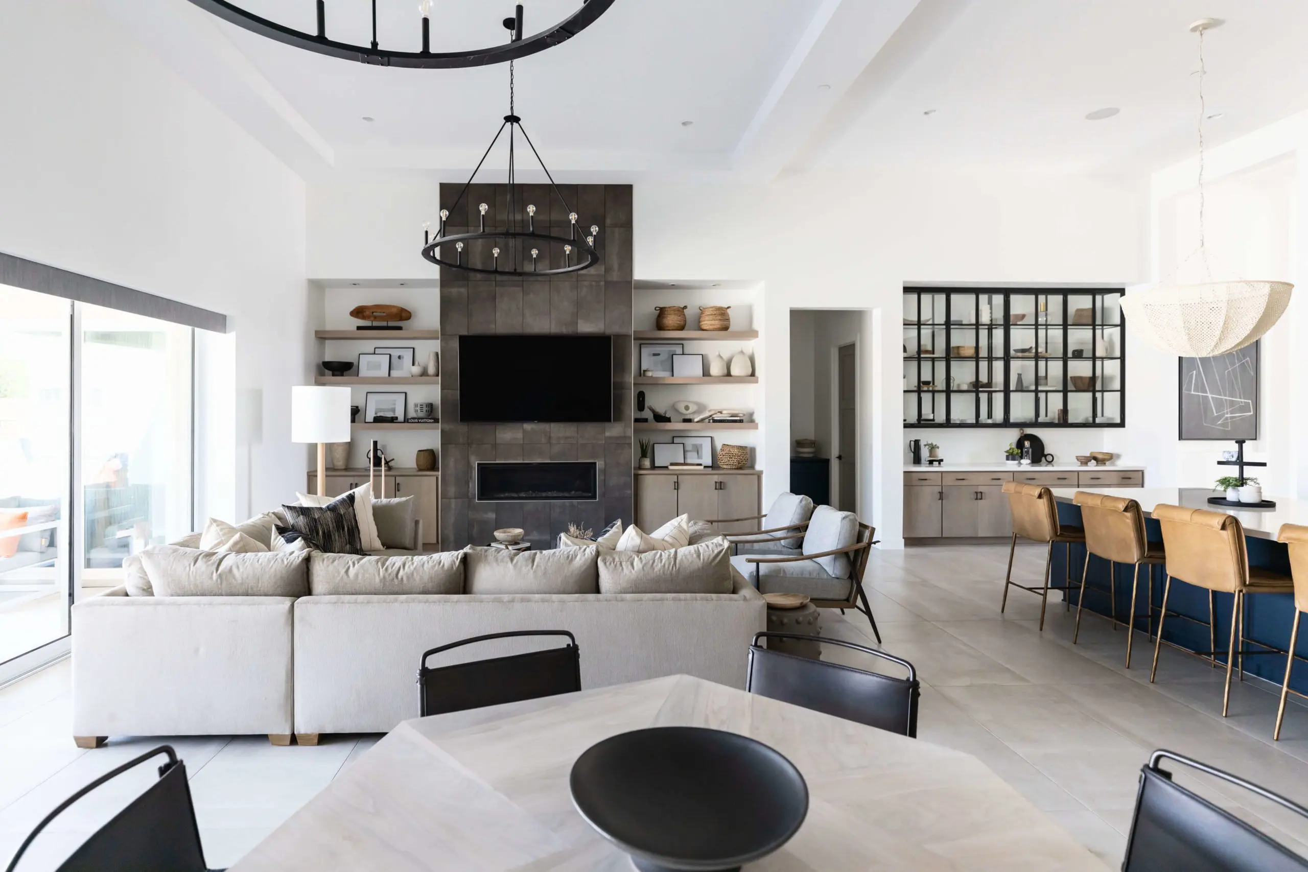 An open-plan living room with a patio view
