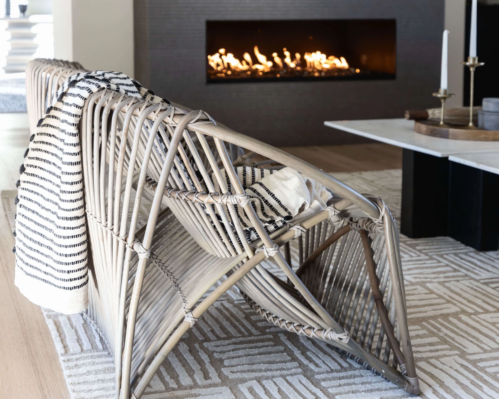 An automated fireplace beneath a flat screen TV